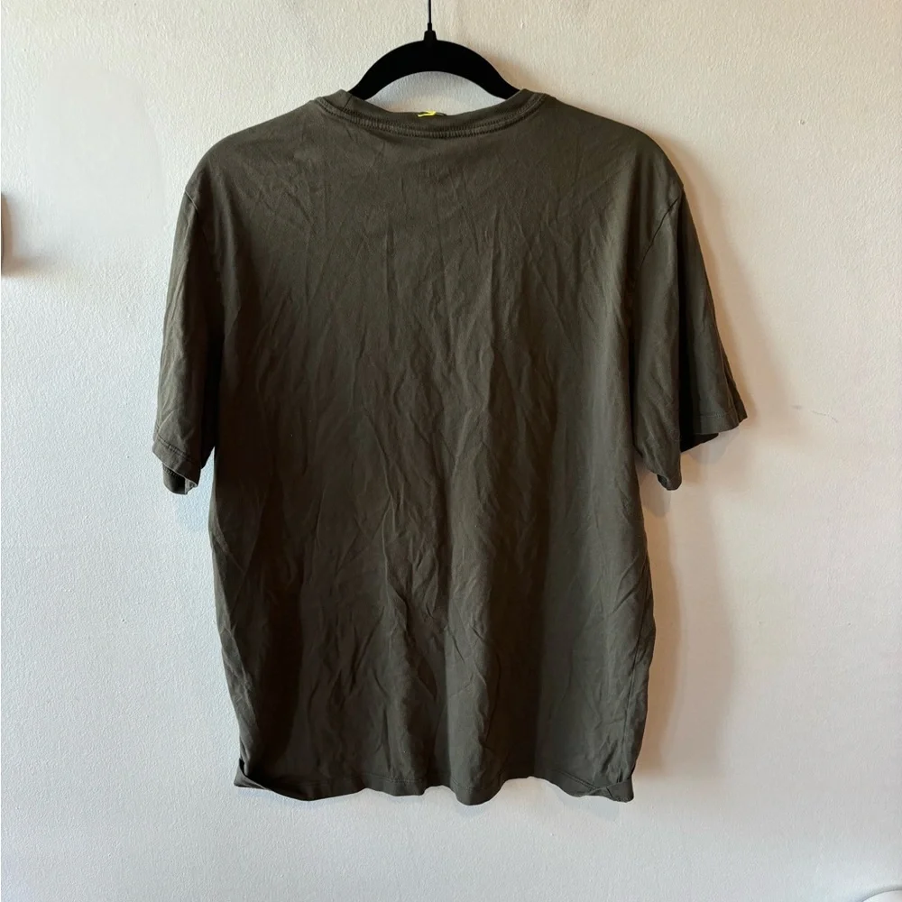 #199 green north face tee